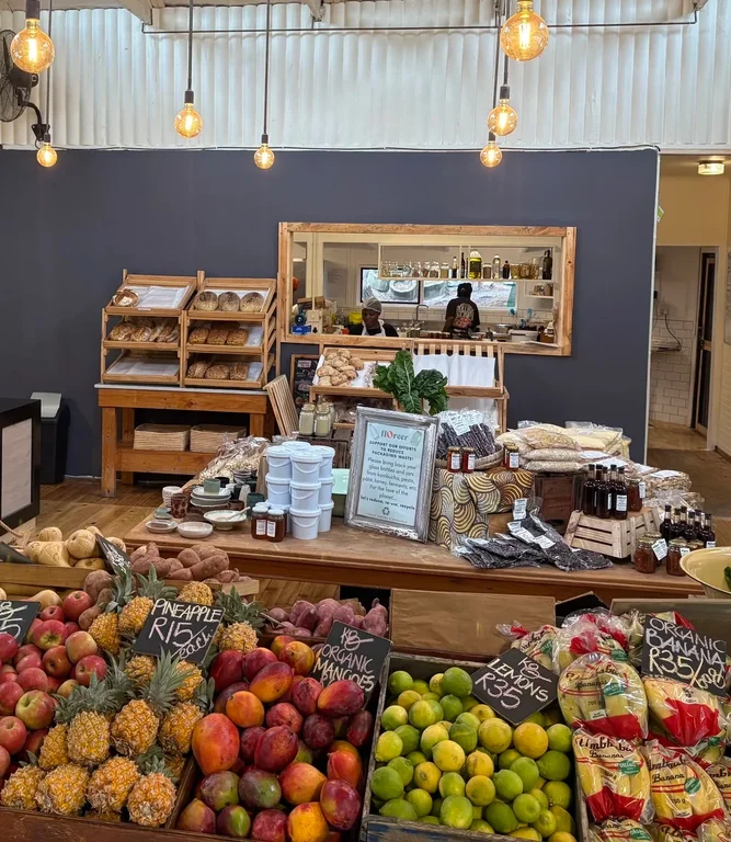 A Floreer team member with a basket of fresh local produce